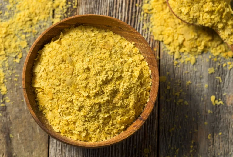 a photo of a container of nutritional yeast